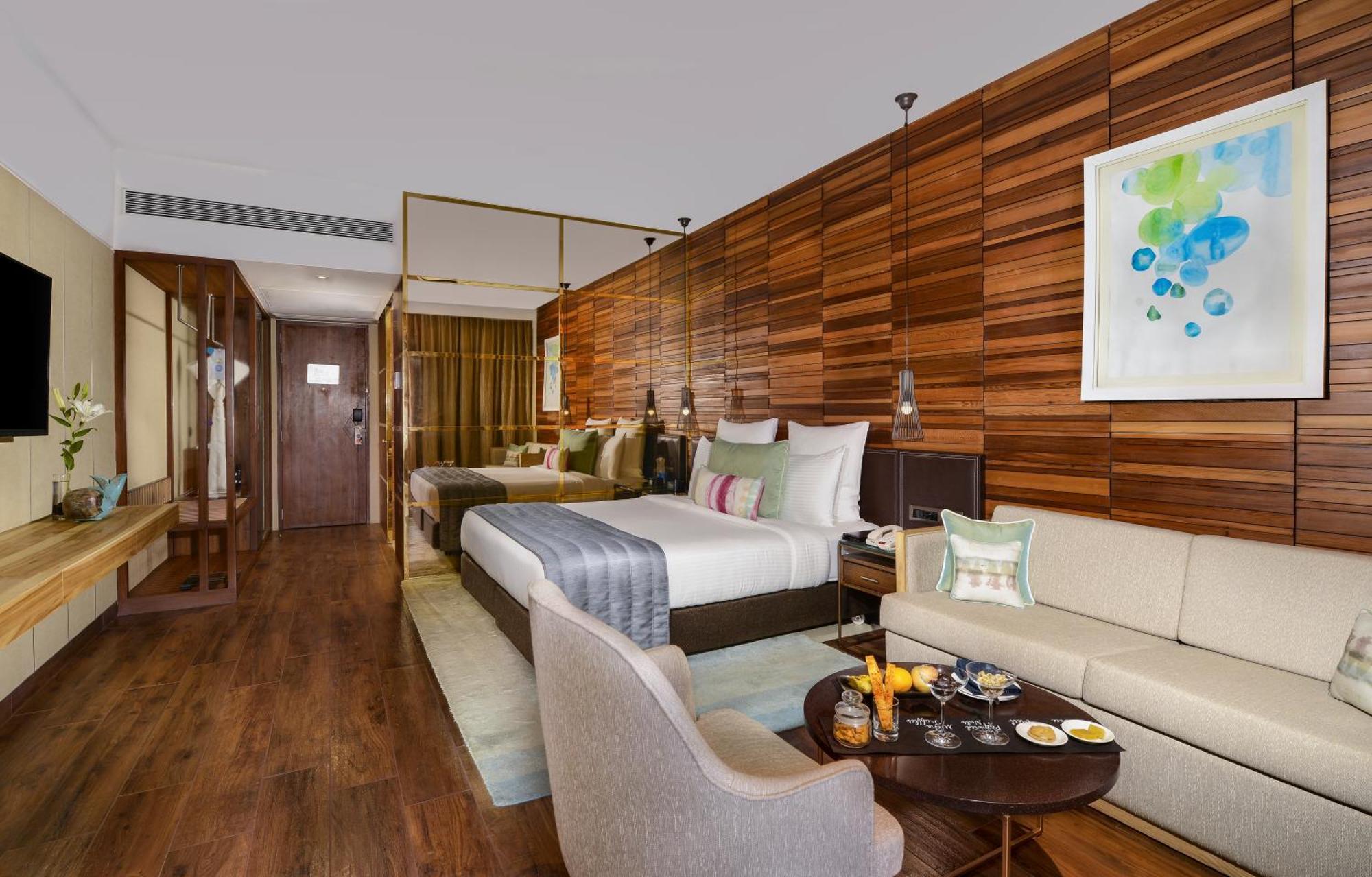 Luxury King Room INR 500 Credit on SPA per Happy Hours 11 5pm to 7pm on Food & Beverages on One way Local transfers